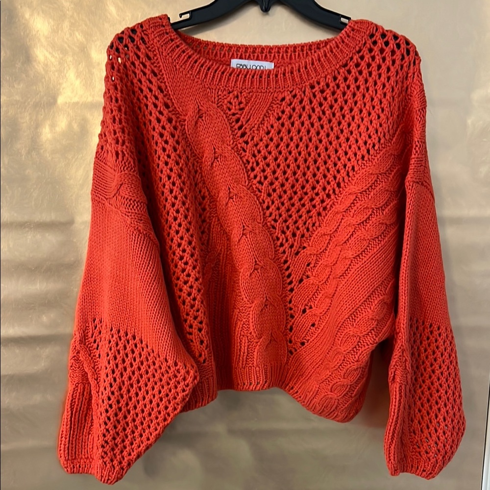 Vibrant Orange Crew Neck Sweater with Intricate Knit Patterns